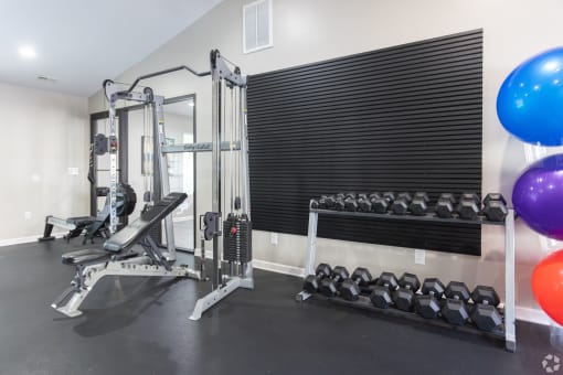 the gym with weights and balloons at the preserve at greatstone