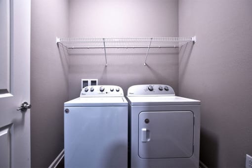 a washer and dryer in a laundry room at Park 33, Goshen