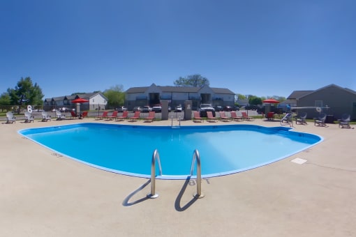 our resort style pool is open to the community and has lounge chairs around it at The Dylan, Murfreesboro