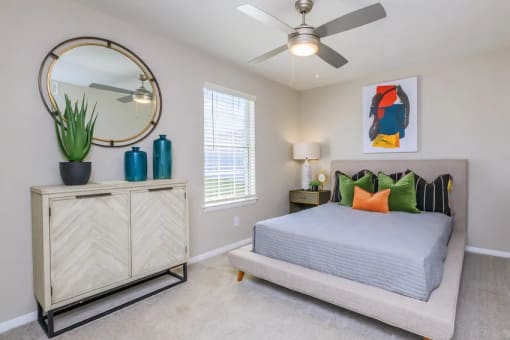a bedroom with a bed and a ceiling fan at The Dylan, Murfreesboro