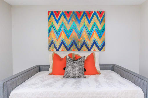 a bedroom with a bed and a painting on the wall at The Dylan, Tennessee, 37129