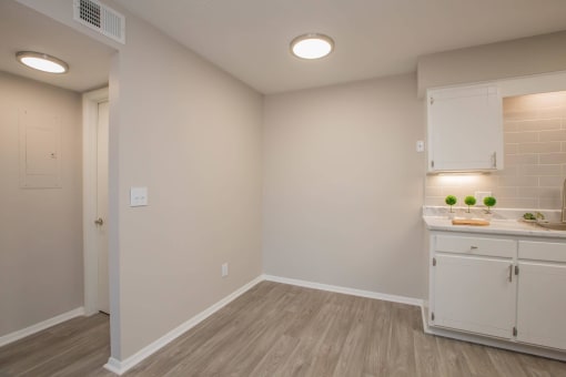a kitchen with white cabinets and a white counter top at The Dylan, Tennessee, 37129