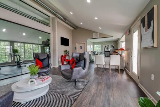 a living room with a couch and a table at The Dylan, Tennessee, 37129
