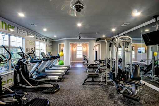 A gym with treadmills, exercise bikes, and other equipment.at Century Ariva, Florida, 33812