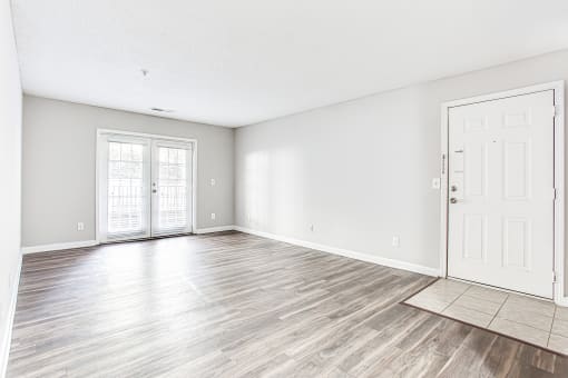Classic living space with sliding glass door at Parkside at Sandy Springs Atlanta, GA