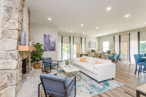 the estates at tanglewood|living room with stone fireplace at Summit East Ridge, East Ridge, 37412
