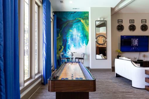 Game Room With Shuffle Board at The Metro Apartments, Atlanta