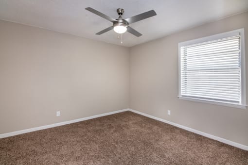 Room with wooden floors at The Cleo Apartments, Athens, Alabama