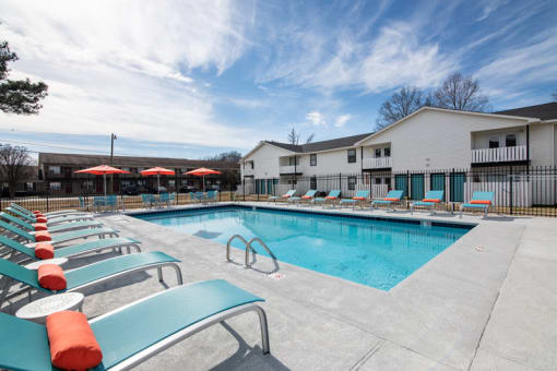 View of pool side with sundeck and patioat The Cleo Apartments, Alabama