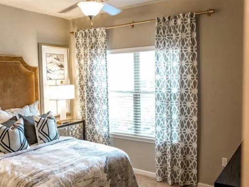 Bedroom With Expansive Windows at Reserves at 700, Big Spring, TX