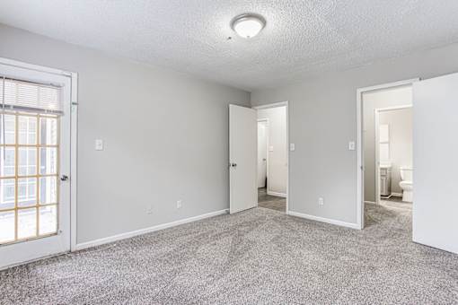 Carpeted Living Area at Wildcreek Apartments, Georgia 30021