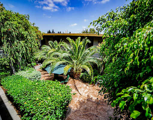 a house with a pool in the backyard