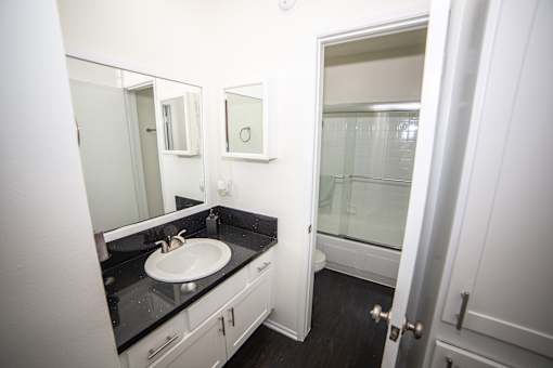 this is a photo of the bathroom of the 882 square foot 2 bedroom apartment at the