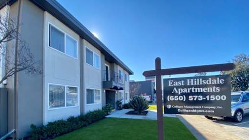 an east hillsdale apartments sign in front of a building