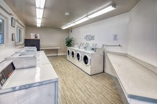 A laundry room with a washer and dryer.