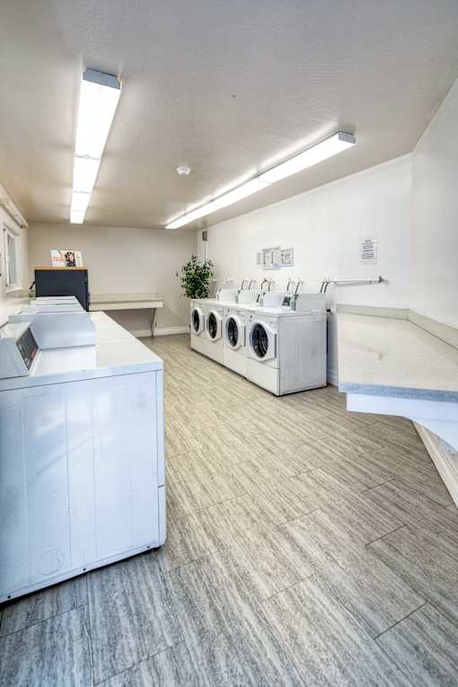 A laundry room with a washer and dryer.