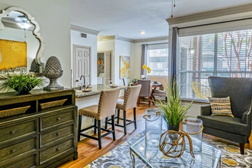 Dining Room With Kitchen at The Aster Sugar Land Apartments, Sugar Land, Texas