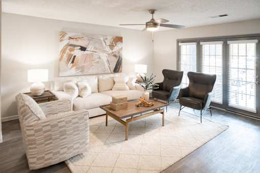 Living Room with a White Couch at The Addison at Collierville Apartments, Collierville