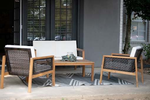 Patio with a White Couch at The Addison at Collierville Apartments, Tennessee, 38017