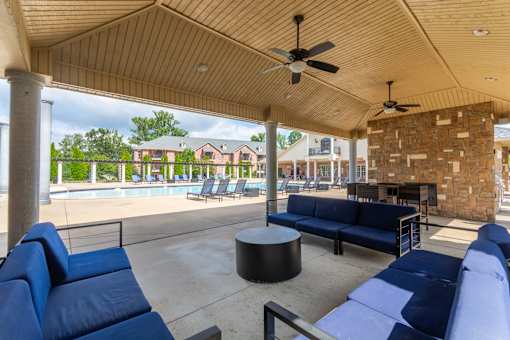 Patio with blue couches at Arlo Luxury Apartment Homes, Little Rock