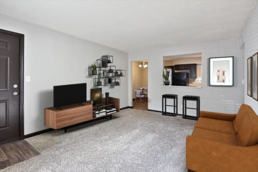Living Room With TV at Artesian East Village in Atlanta