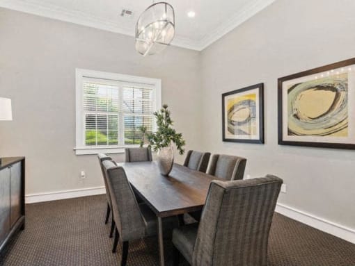 Conference Space with Elegant Lighting and Wood Plank Vinyl Flooring at Cambridge Square Apartments, Overland Park, KS 66211