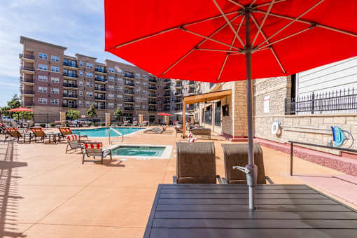 Poolside Umbrella Chairs at Carson Street Towers, Overland Park, 66223