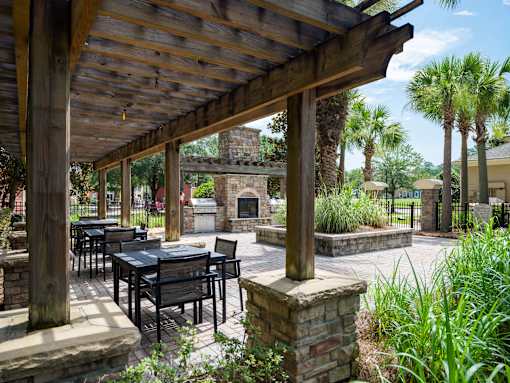 Outdoor pavilion with grilling station and fireplace at Courtney Bend Apartments, Hardeeville, 29927