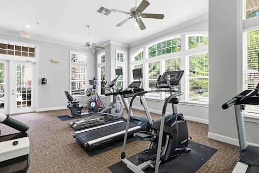 Spacious fitness center with treadmills and ellipticals at Courtney Bend Apartments, Hardeeville