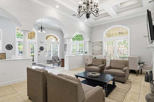 Clubhouse lobby with coffered ceiling and chandelier at Courtney Bend Apartments, Hardeeville