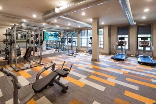 Fitness Center with Cardio, CrossFit & Yoga Components at Echo at North Pointe Center Apartment Homes, Alpharetta, GA 30009
