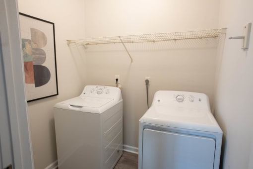 a small laundry room with a washer and dryer at Appling Lakes, Cordova, TN, 38016