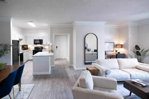 a living room filled with furniture and a large window at Appling Lakes, Cordova