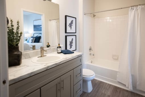 a bathroom with a toilet sink and bathtub at Appling Lakes, Tennessee