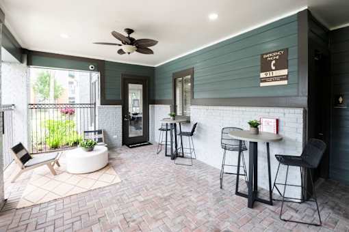 Pool side patio at The Fenwick Apartment Homes, Humble, 77396