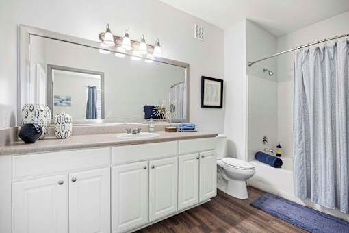 Large Soaking Tub In Bathroom with white cabinet at The Shallowford Apartments, Chattanooga