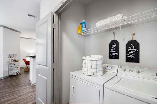 Laundry room with a washer and dryer at The Shallowford Apartments, Tennessee, 37421