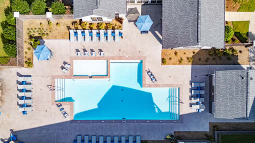 arial view of a swimming pool in a backyard with umbrellas and chairs at The Shallowford, Chattanooga