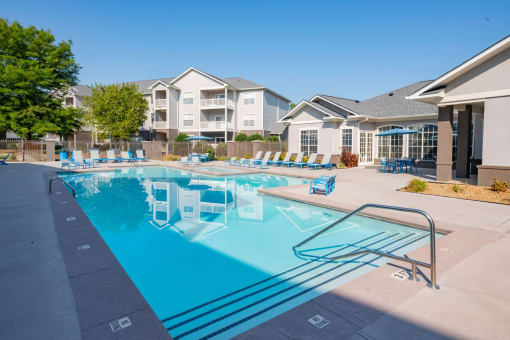 our apartments have a resort style pool with lounge chairs at The Shallowford, Chattanooga, TN, 37421
