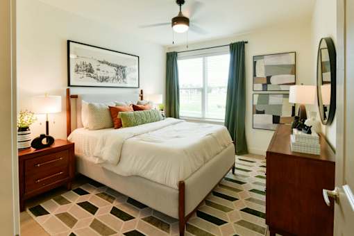 A bright and modern bedroom with warm natural colors