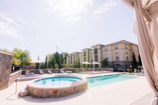 the swimming pool at our apartments at The Villa at River Pointe, Maumelle, AR 72213