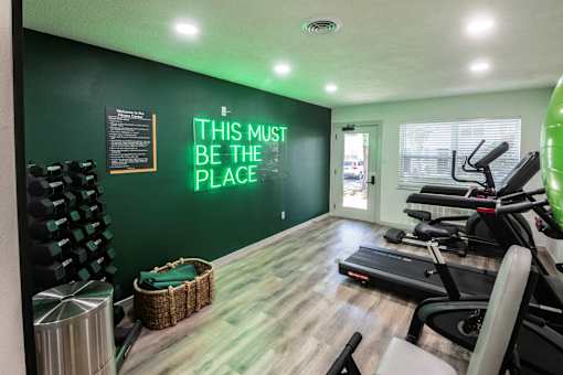 Fitness wellness center with free weights at The Garden District Apartments, Germantown, TN, Tennessee , 38138