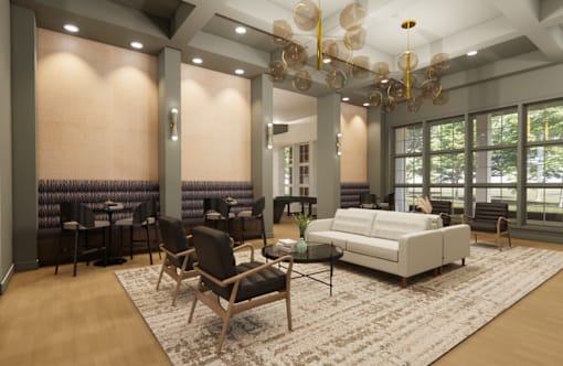 A modern living room with a white sofa and a wooden floor at Grays Creek Apartments, Tennessee