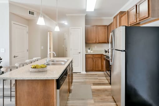 Kitchen with Stainless Steel Appliances and cabinets at Harbor Island Apartments, Tennessee