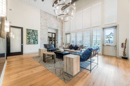 a living room filled with furniture and a large window at The Livano Kemah, Kemah, 77565