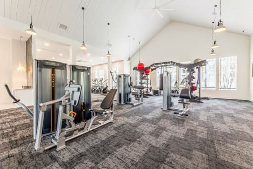 the gym at the enclave at woodbridge apartments in sugar land, tx at The Livano Kemah, Kemah, TX, 77565