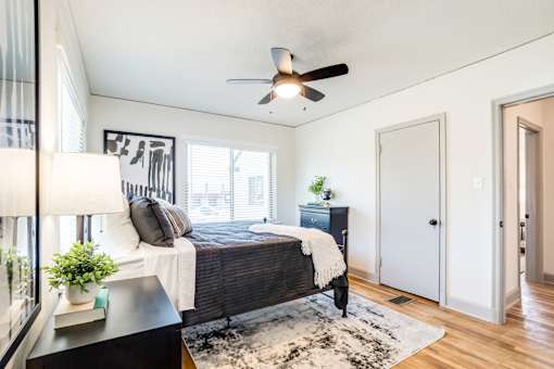 a bedroom with a ceiling fan at Kiwi Goji Apartments, Memphis, TN,  38111