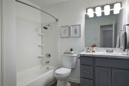 Bathroom with mirror at Normandy Woods in Riviera East, Houston, TX, 77015