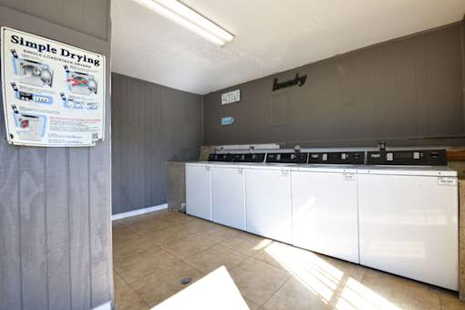 Laundry room at Normandy Woods in Riviera East, Houston, TX, 77015