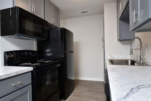 Kitchen at Normandy Woods in Riviera East, Houston, TX, 77015